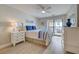 Charming bedroom with sliding glass door to balcony and water view at 14459 River Beach Dr # 218, Port Charlotte, FL 33953