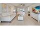 Bright living room features stylish furnishings, decor, and an open layout that flows into the kitchen and other living spaces at 14459 River Beach Dr # 218, Port Charlotte, FL 33953