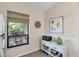 Eat-in kitchen nook featuring natural light, white cabinets, and decorative accents at 1709 Curry Trl # 30, North Venice, FL 34275