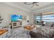 Relaxing living room with plush seating, decorative rug and view of the water at 17610 Polo Trl, Bradenton, FL 34211