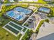 This community features Tennis courts and bocce ball with beautiful, manicured landscaping at 17610 Polo Trl, Bradenton, FL 34211