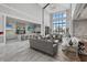 Expansive common room featuring a kitchen, bar, and multiple seating areas for entertaining and socializing at 17814 Cresswind Ter, Bradenton, FL 34211