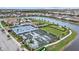 Aerial view of the neighborhood showing tennis and pickleball courts and lawn area at 17814 Cresswind Ter, Bradenton, FL 34211