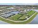 Aerial view of community amenities with tennis courts, clubhouse, pool, and recreational area at 17814 Cresswind Ter, Bradenton, FL 34211