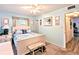 Bedroom featuring light blue walls and nautical-themed bedding at 2057 Sunset Dr # G1, Bradenton, FL 34207