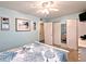 Bright bedroom with closet and nautical-themed bedding and decor at 2057 Sunset Dr # G1, Bradenton, FL 34207