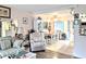 Bright living room view looking towards the dining area at 2057 Sunset Dr # G1, Bradenton, FL 34207