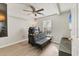 Bedroom with a futon, desk, ceiling fan, and a window at 2219 12Th W Ave, Bradenton, FL 34205