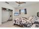 Bright bedroom features a ceiling fan and a large closet for ample storage at 2219 12Th W Ave, Bradenton, FL 34205