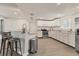 Bright kitchen featuring modern appliances, granite countertops, stainless steel appliances, and hardwood floors at 2219 12Th W Ave, Bradenton, FL 34205