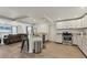 Stylish kitchen with white cabinets, stone countertops, stainless steel appliances, and an open layout at 2219 12Th W Ave, Bradenton, FL 34205