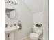 Powder room features a pedestal sink, toilet, mirror, and updated fixtures at 2219 12Th W Ave, Bradenton, FL 34205