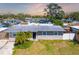 Charming single-story home featuring a well-maintained yard and welcoming entrance at 2406 25Th W Ave, Bradenton, FL 34205