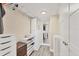 Walk-in closet featuring built-in shelving and ample storage space at 250 Santa Maria St # 215, Venice, FL 34285