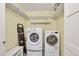 Laundry area with shelving, washer and dryer units at 250 Santa Maria St # 215, Venice, FL 34285