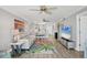Comfortable living area with an open floor plan leading to the kitchen and dining space at 250 Santa Maria St # 215, Venice, FL 34285