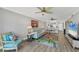 Open living room with nice decor flowing into the dining area, creating a welcoming and airy space at 250 Santa Maria St # 215, Venice, FL 34285