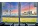 Breathtaking marina view through the large glass window, providing a serene and picturesque backdrop at 250 Santa Maria St # 215, Venice, FL 34285