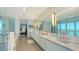 Long bathroom vanity with an open view at 280 Golden Gate Pt # 400, Sarasota, FL 34236