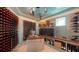 This luxurious wine cellar features custom racks, elegant lighting, and ample storage for an extensive collection at 280 Golden Gate Pt # 400, Sarasota, FL 34236