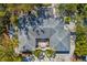 Overhead view of the property featuring a landscaped courtyard and inviting outdoor spaces at 3086 Pinecrest St, Sarasota, FL 34239