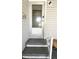Charming front entrance with a welcoming door and decorative steps at 3335 Spanish Oak Ter, Sarasota, FL 34237