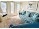 A comfortable living room with natural light and neutral tones at 3335 Spanish Oak Ter, Sarasota, FL 34237