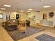 Comfortable lobby area with inviting seating arrangements and a welcoming reception desk at 3335 Spanish Oak Ter, Sarasota, FL 34237
