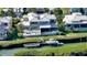 Waterfront property with a pool, dock, and boat lift, perfect for enjoying coastal living at 3540 Mistletoe Ln, Longboat Key, FL 34228