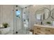 Modern bathroom featuring glass shower, updated vanity, and neutral color palette at 3540 Mistletoe Ln, Longboat Key, FL 34228
