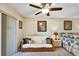 Inviting bedroom with a comfy daybed and tropical accents at 3698 Lake Bayshore Dr # K-410, Bradenton, FL 34205