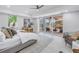 Spacious bedroom with a private walkout patio, lots of natural light, and a modern design at 3935 N Shell Rd, Sarasota, FL 34242