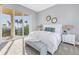 Inviting bedroom with beach views, a comfortable bed, and stylish décor for a relaxing retreat at 3935 N Shell Rd, Sarasota, FL 34242