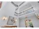 Elegant staircase with decorative railings and an open view of the home's interior at 3935 N Shell Rd, Sarasota, FL 34242