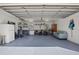 Spacious garage with organized storage, work area, and ample room for vehicles and equipment at 4003 3Rd Nw Ave, Bradenton, FL 34209