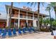 Relax by the pool in comfortable lounge chairs at the spacious clubhouse and enjoy the beautiful view at 428 Islebay Dr, Apollo Beach, FL 33572