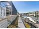 Exterior view of a dock featuring a boat lift and a waterfront view at 428 Islebay Dr, Apollo Beach, FL 33572