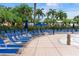 Relaxing pool area offers lots of lounge chairs and umbrellas for residents at 428 Islebay Dr, Apollo Beach, FL 33572