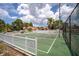 Community basketball court with bright lines, a sturdy fence and is surrounded by mature trees at 4330 47Th W Ave # 104, Bradenton, FL 34210