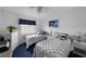 Guest bedroom featuring twin beds, nautical themed bedding, coastal decor and white furnishings at 4330 47Th W Ave # 104, Bradenton, FL 34210