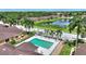 Aerial view of a townhouse with a private pool and lush landscaping at 4790 Turnberry Cir, North Port, FL 34288
