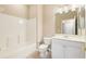 Bathroom with a shower-tub, a neutral wall color, and tiled flooring at 4790 Turnberry Cir, North Port, FL 34288