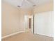 Bedroom with carpet flooring, closet and neutral wall color at 4790 Turnberry Cir, North Port, FL 34288
