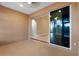 Covered patio with a large sliding glass door that leads into a bright Florida room at 4790 Turnberry Cir, North Port, FL 34288