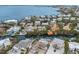 Aerial view of a residential area along the water, showcasing waterfront homes and canals at 507 59Th St, Holmes Beach, FL 34217
