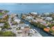 Stunning aerial view of waterfront homes along canals with boat docks and sparkling blue water at 507 59Th St, Holmes Beach, FL 34217