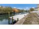 Home with private dock and boatlift, offering serene waterfront views at 507 59Th St, Holmes Beach, FL 34217