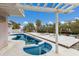Backyard oasis with a uniquely shaped pool, patio, and waterfront access at 507 59Th St, Holmes Beach, FL 34217