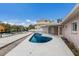 Backyard pool area, featuring a uniquely shaped pool, patio, and waterfront access at 507 59Th St, Holmes Beach, FL 34217