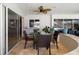 Relaxing covered patio with ceiling fan and views of the yard at 5111 Canterbury Dr, Sarasota, FL 34243